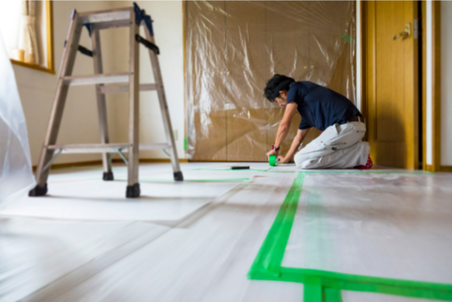 Construction worker remodeling home